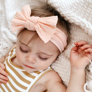 Mia Cable Knit Bow Headwrap | Peach Blossom - Adassa Rose